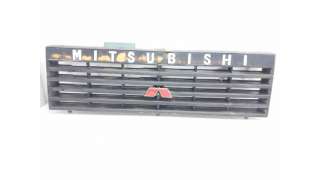 REJILLA DELANTERA MITSUBISHI MONTERO (1987-1991) 2.5 TD (L044G, L049G) 87CV 2477CC - L.7997286 / MB404626