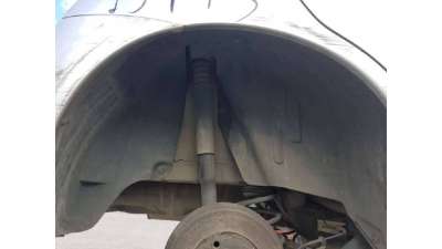 PLASTICO PASE RUEDA TRAS. DCH. NISSAN...