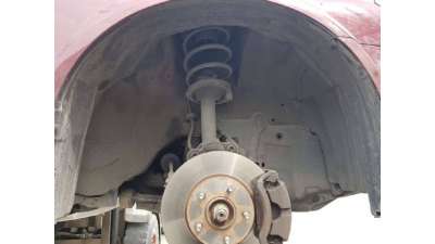 PLASTICO PASE RUEDA DEL. DCH. NISSAN...