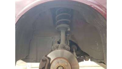 PLASTICO PASE RUEDA DEL. IZQ. NISSAN...