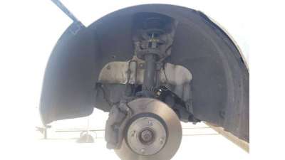 PLASTICO PASE RUEDA DEL. IZQ. FORD...