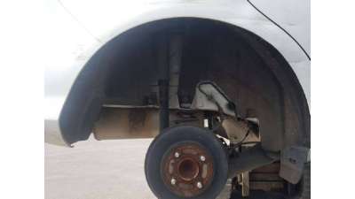 PLASTICO PASE RUEDA TRAS. DCH. FORD...