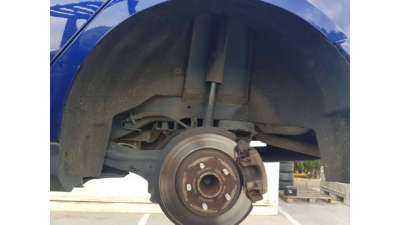 PLASTICO PASE RUEDA TRAS. IZQ. FORD...