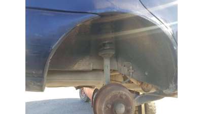 PLASTICO PASE RUEDA TRAS. DCH. FORD...