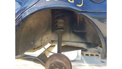 PLASTICO PASE RUEDA TRAS. IZQ. FORD...
