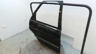 Recambio de puerta trasera derecha para ford escort berlina/turnier 1990- referencia OEM IAM  24752 