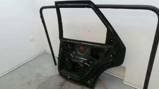 Recambio de puerta trasera derecha para ford escort berlina/turnier 1990- referencia OEM IAM  24752 