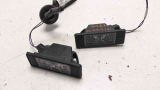 Recambio de piloto matricula para nissan nv 200 (m20) 2009- kombi comfort referencia OEM IAM 25300100  
