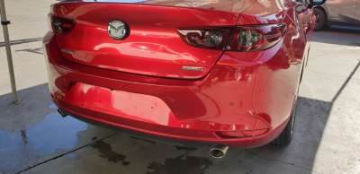 Recambio de paragolpes trasero para mazda 3 sedán (bp) 2019- evolution referencia OEM IAM BCKA50221ABB  
