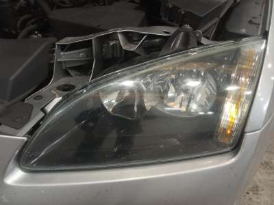 Recambio de faro izquierdo para ford focus berlina (cap) 2004-2007 sport referencia OEM IAM   