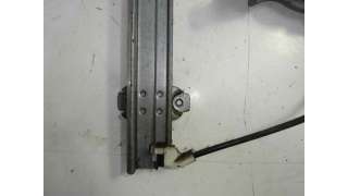 ELEVALUNAS TRASERO DERECHO NISSAN PRIMERA TRAV.  - M.623142 / 016923