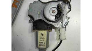 ELEVALUNAS TRASERO DERECHO NISSAN PRIMERA TRAV.  - M.623142 / 016923