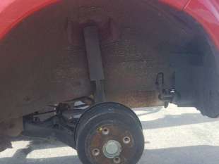 PLASTICO PASE RUEDA TRAS. IZQ. OPEL TIGRA TWIN TOP 1.4 16V (90 CV) DE 2009 - D.4413527